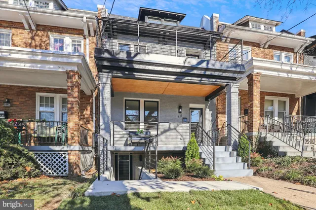 a view of a chairs and a table in the patio