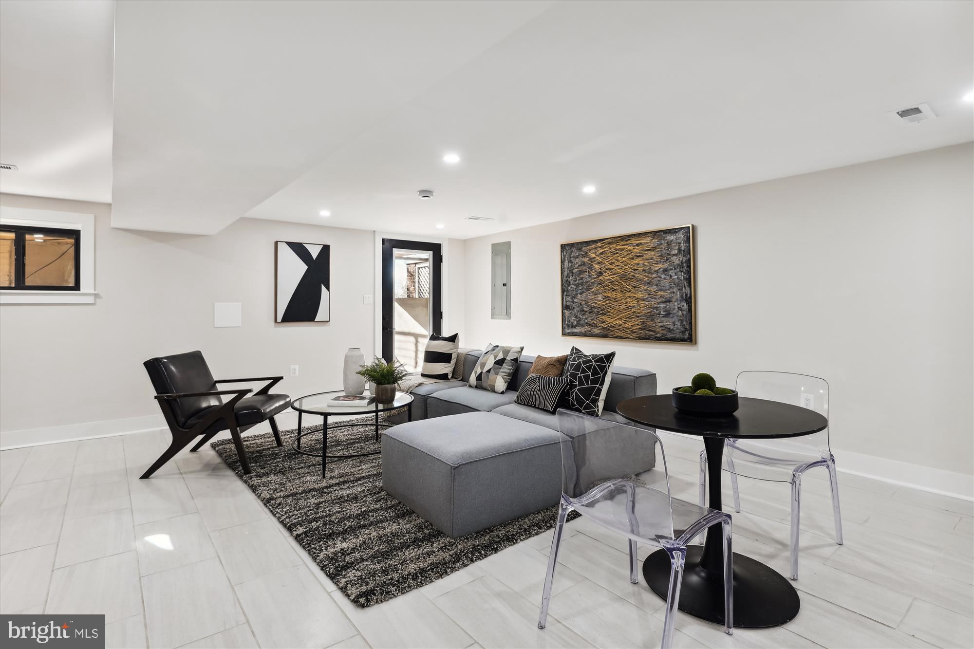 411 Decatur Street Northwest Washington, DC 20011 - Photo 39 of 52 a living room with furniture and a rug