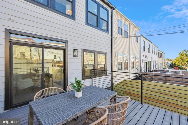 a view of a balcony with wooden floor