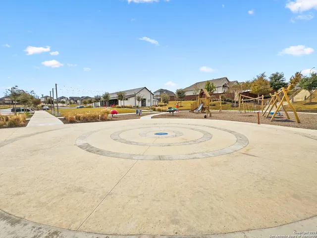 a view of a swimming pool and an outdoor space
