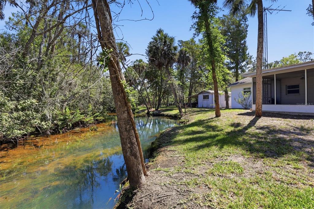 6244 Colony Circle Weeki Wachee, FL 34607 - Photo 13 of 60 a view of a house with pool and sitting area