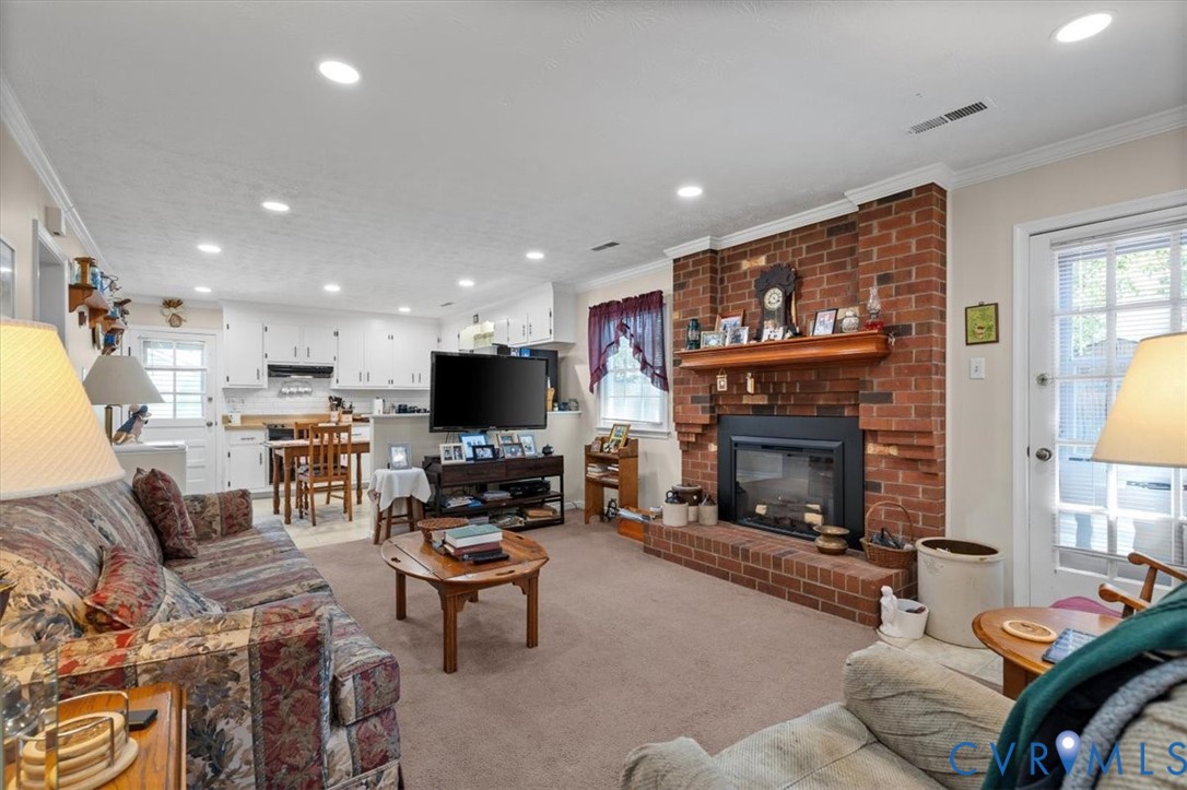 9907 Indian Point Road North Chesterfield, VA 23237 - Photo 5 of 21 Spacious interior featuring a brick fireplace with