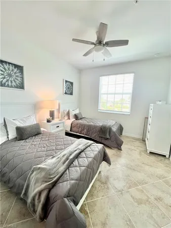 a bedroom with a bed and a view of bathroom