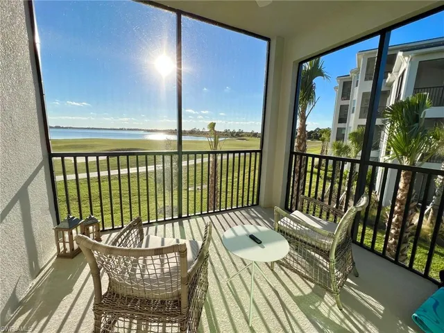 a view of a balcony with wooden floor