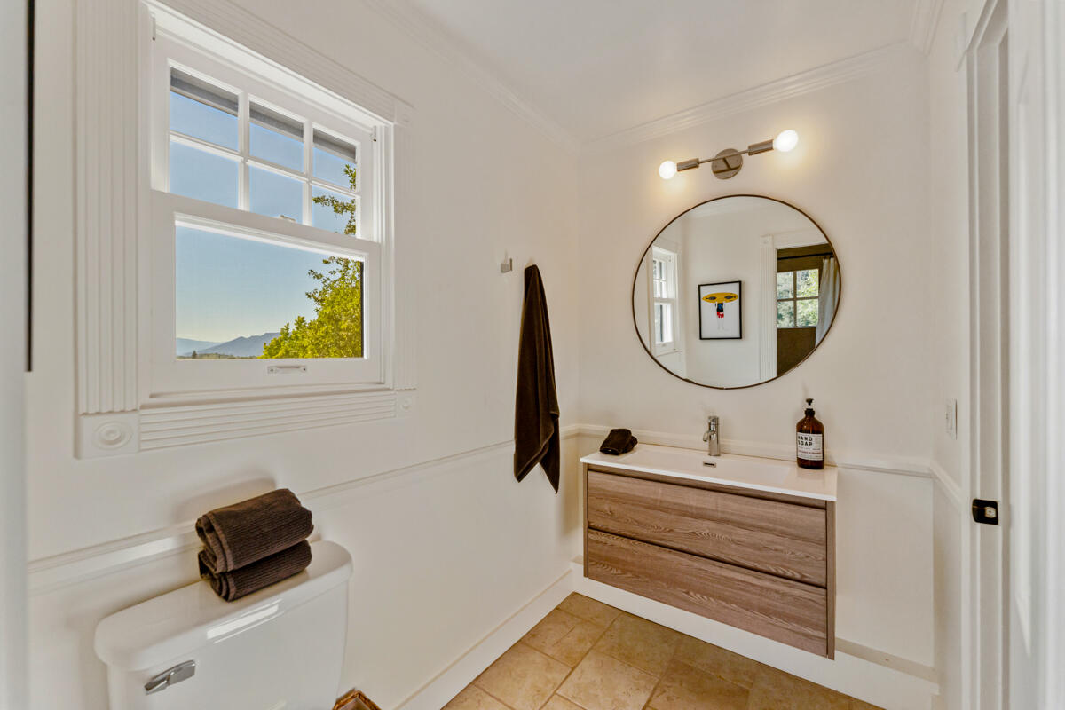 13100 Ojai Road Santa Paula, CA 93060 - Photo 31 of 60 a bathroom with a sink and a mirror