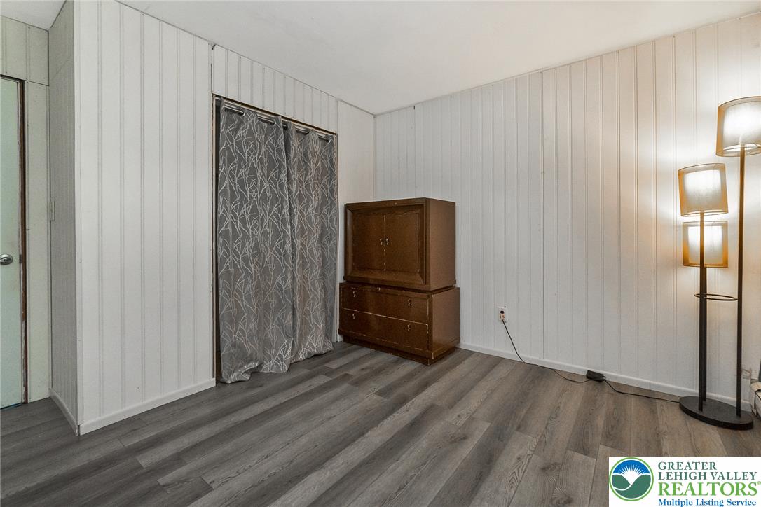 135 Haney Road Kunkletown, PA 18058 - Photo 29 of 53 a view of empty room with wooden floor