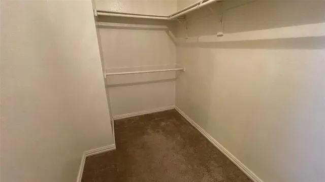 a bathroom with a sink a toilet and a shower