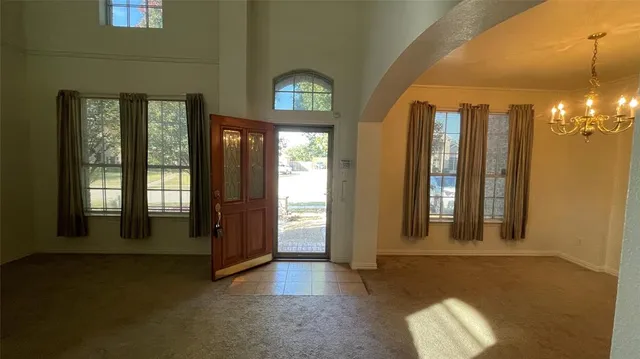 a view of a room with a swimming pool