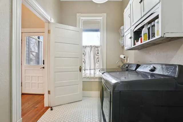 a view of a livingroom with furniture and a ceiling fan