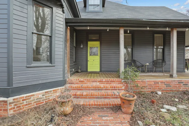 a front view of a house with a garage