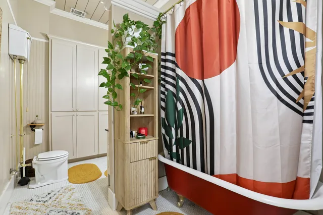 a view of a balcony with chair and table