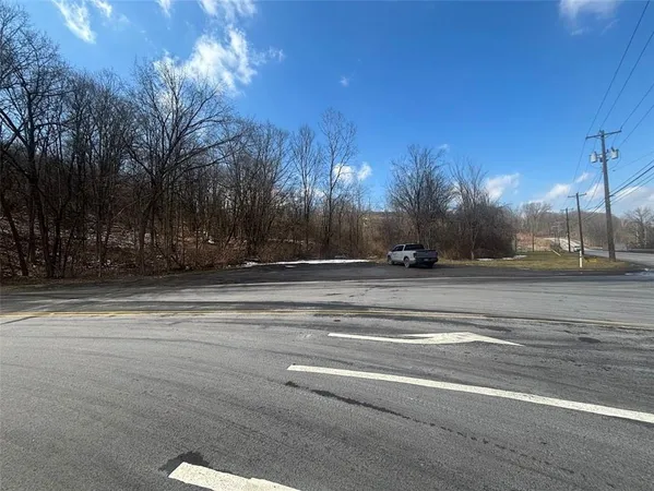 a view of road with trees
