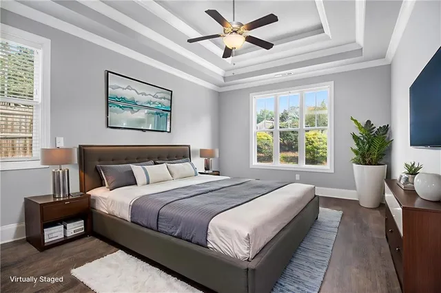 a spacious bedroom with a large bed and a window