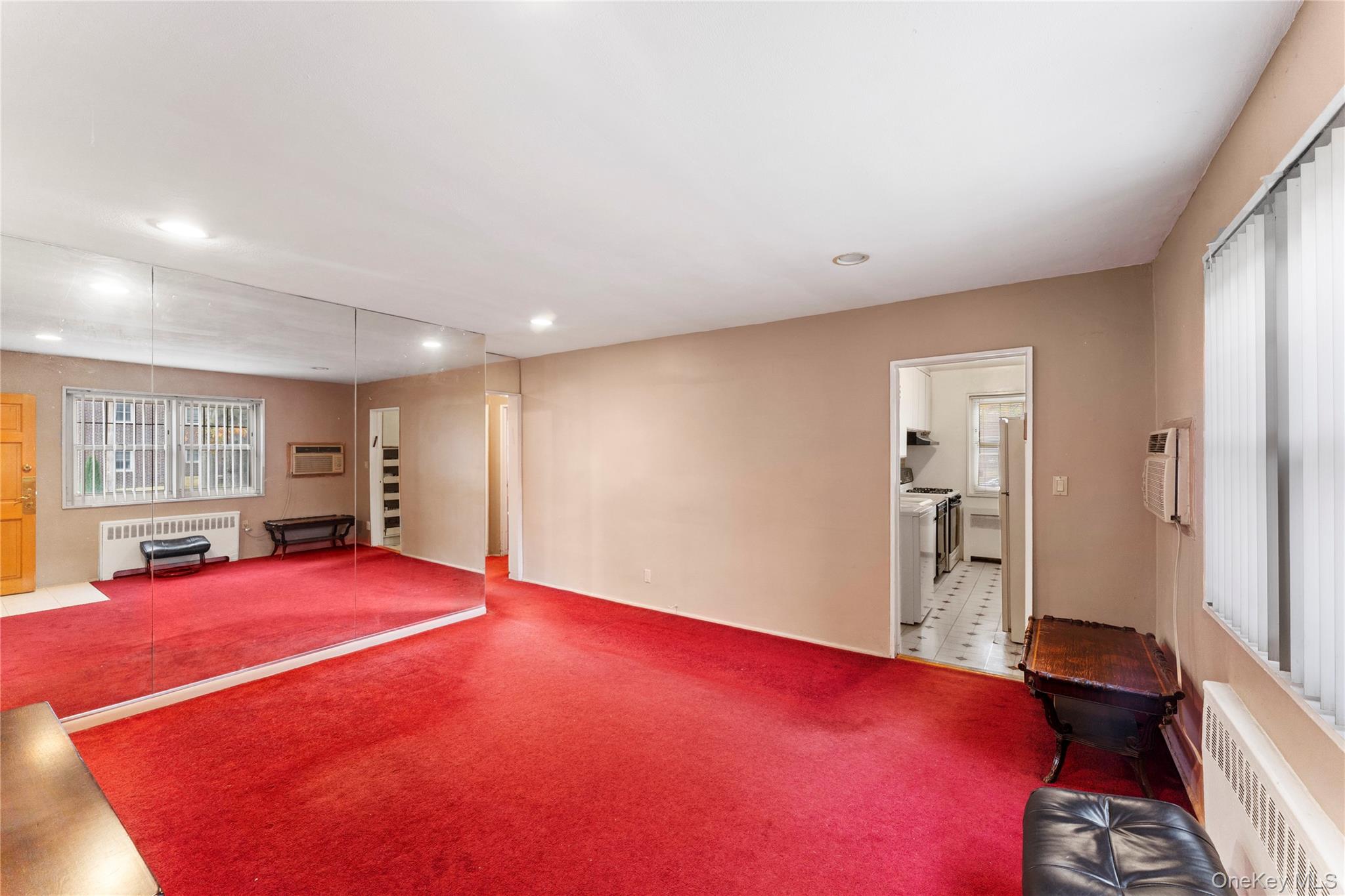 251-29 61st Avenue, Unit 2719 Queens, NY 11362 - Photo 11 of 19 a big room with windows and closet