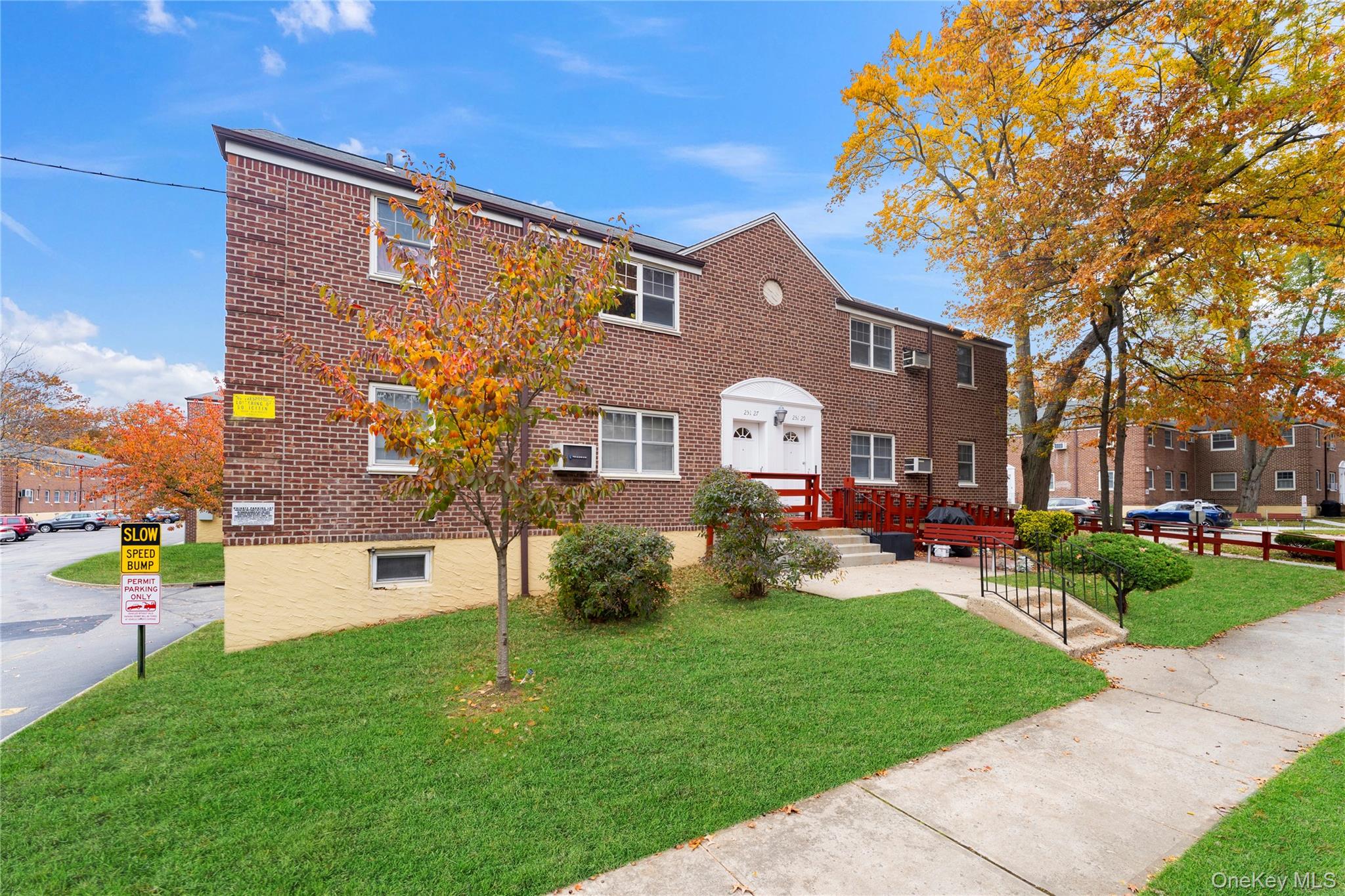 251-29 61st Avenue, Unit 2719 Queens, NY 11362 - Photo 3 of 19 a front view of a house with garden