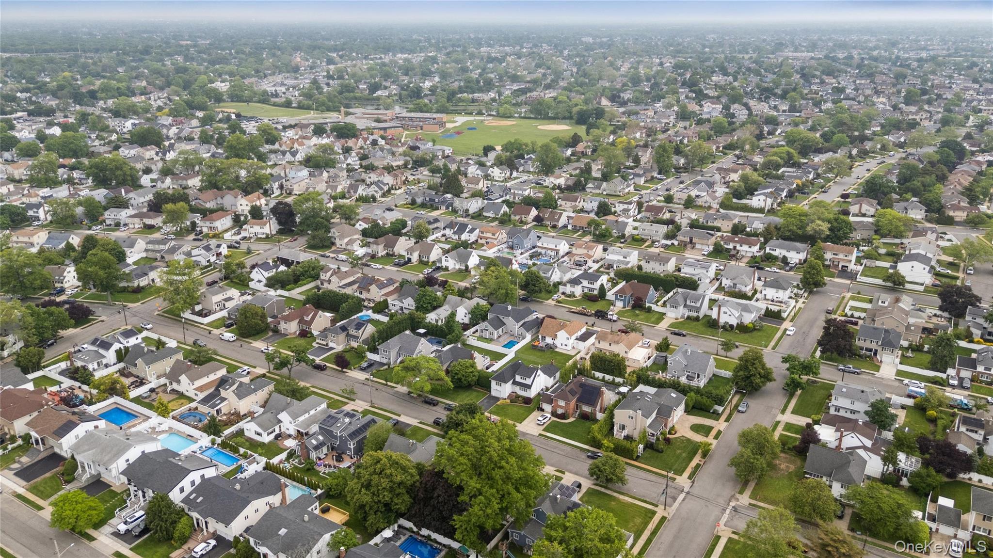2772 Riverside Avenue Merrick, NY 11566 - Photo 37 of 45 an aerial view of residential houses with outdoor space