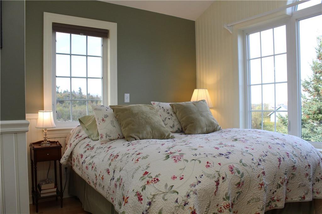 98 Carrying Place Cove Road Lubec, ME 04652 - Photo 23 of 35 Master bedroom in the Carriage...
