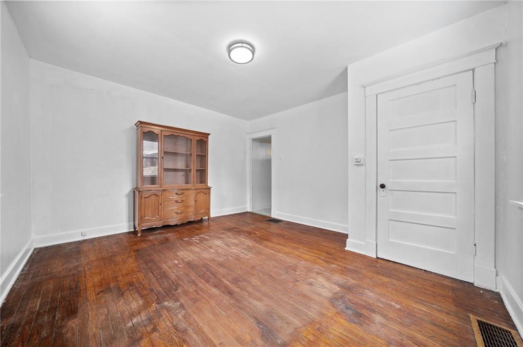 1341 Scrubgrass Road Carnegie, PA 15106 - Photo 7 of 21 a view of an empty room and a kitchen