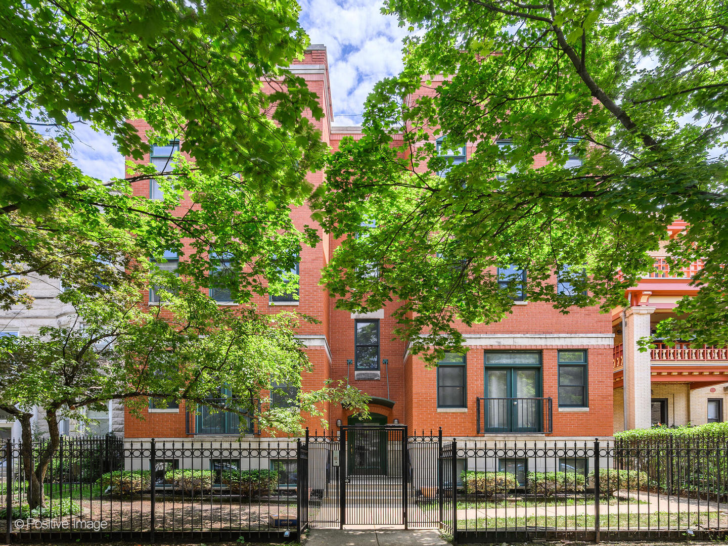 4315 North Kenmore Avenue, Unit 1N Chicago, IL 60613 - Photo 1 of 27 front view of a house with a tree