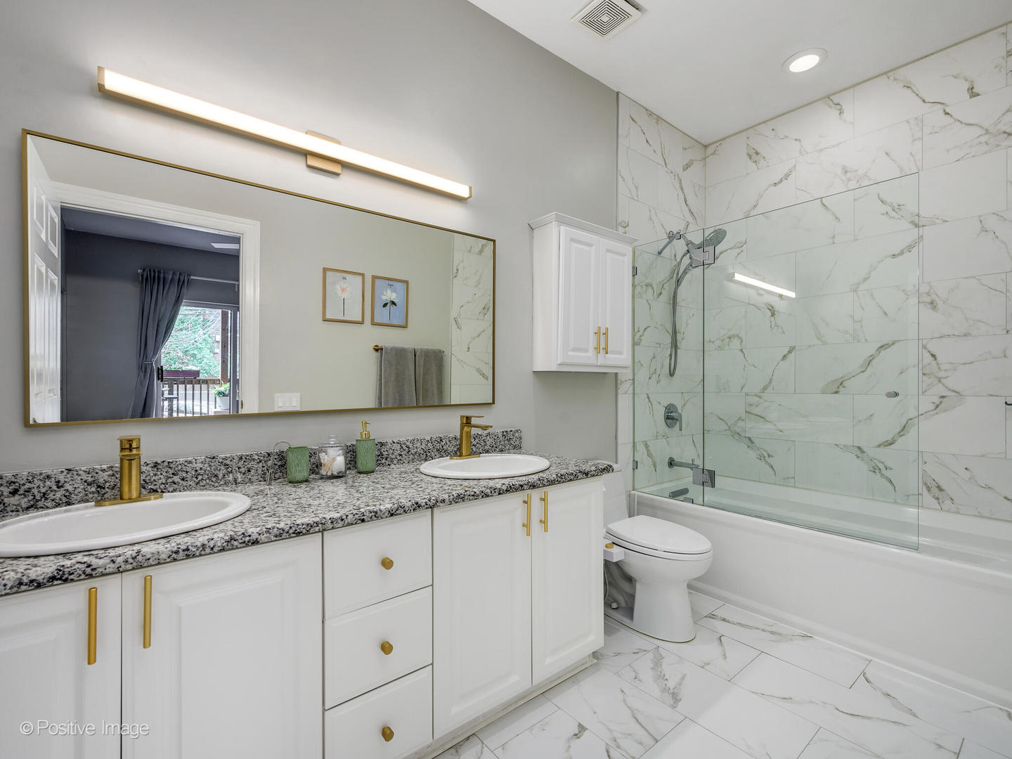 4315 North Kenmore Avenue, Unit 1N Chicago, IL 60613 - Photo 15 of 27 a bathroom with a granite countertop sink toilet and shower