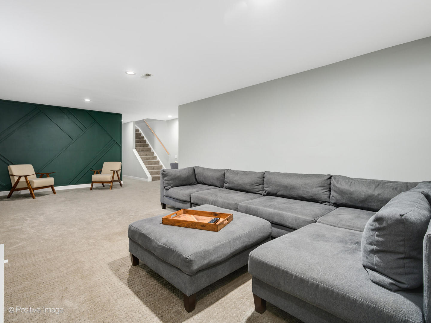 4315 North Kenmore Avenue, Unit 1N Chicago, IL 60613 - Photo 21 of 27 a living room with furniture and a flat screen tv