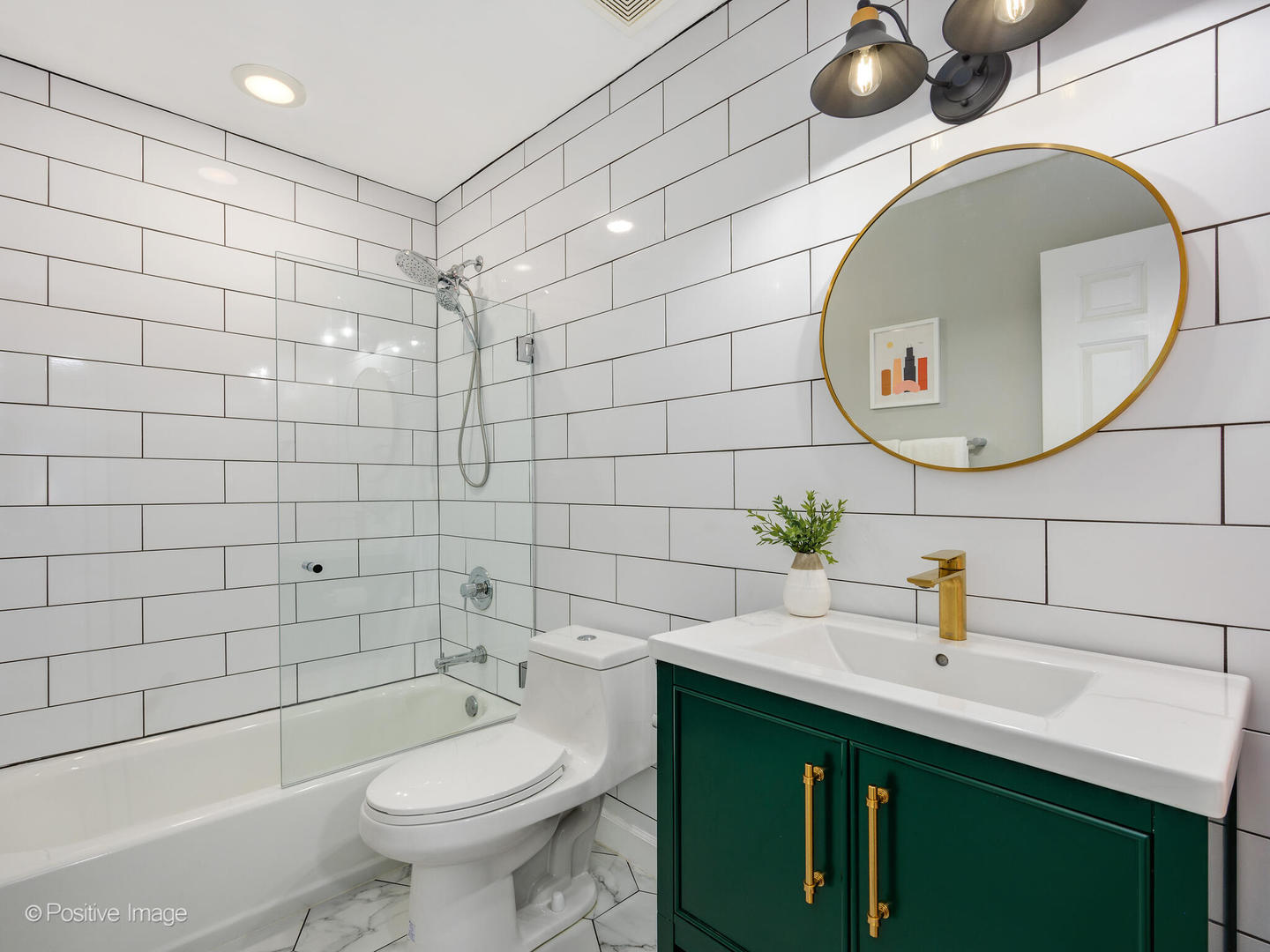 4315 North Kenmore Avenue, Unit 1N Chicago, IL 60613 - Photo 25 of 27 a bathroom with a sink and a mirror