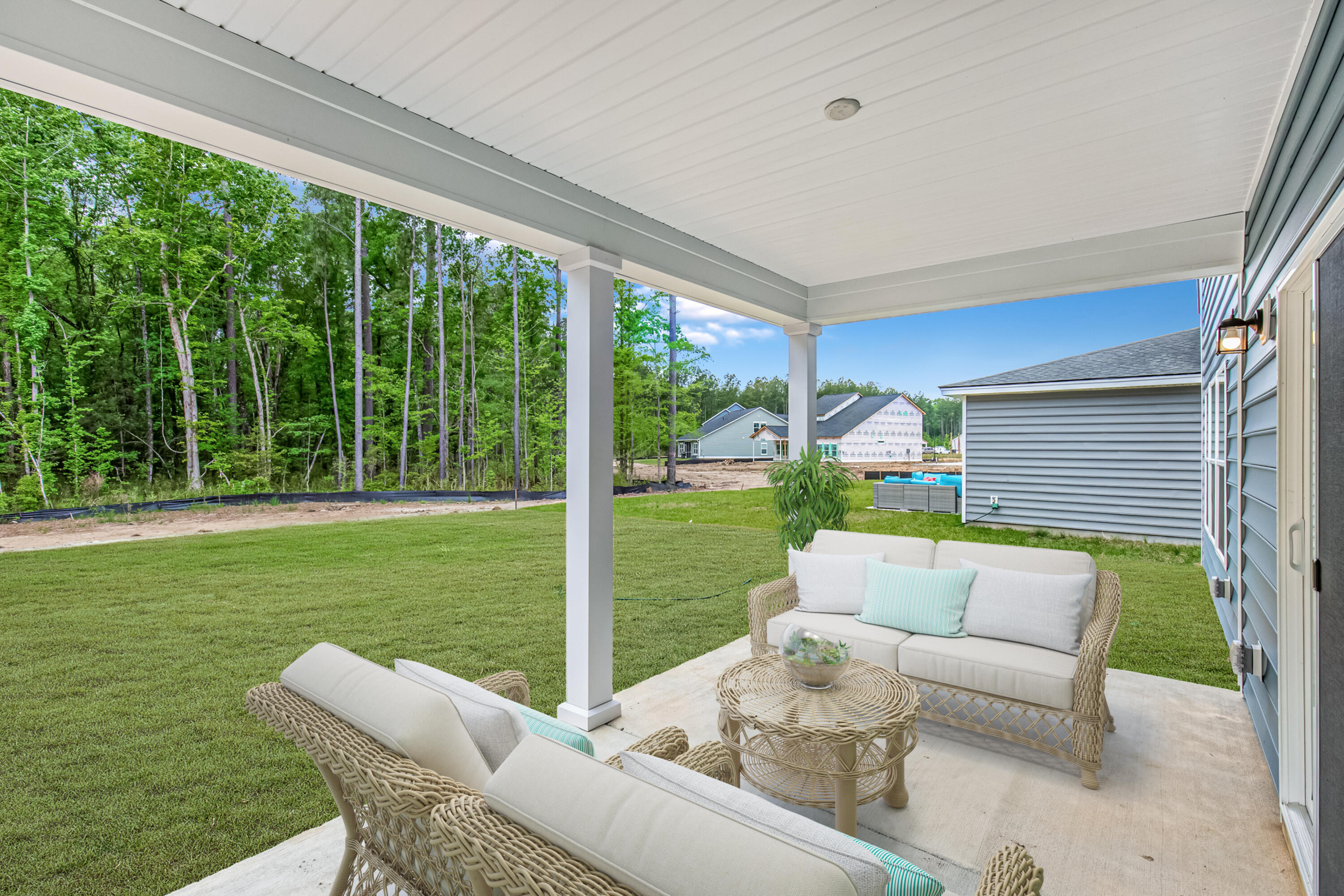 142 Post Mill Drive Summerville, SC 29485 - Photo 9 of 32 SWEETGRASS COVERED PORCH