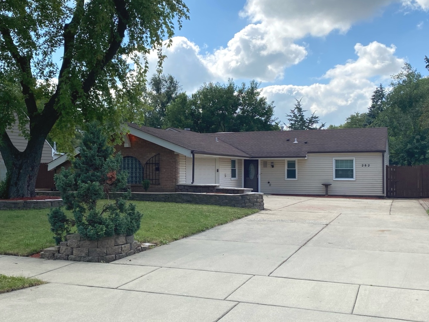 282 Seabury Road Bolingbrook, IL 60440 - Photo 1 of 41 a house view with a garden space