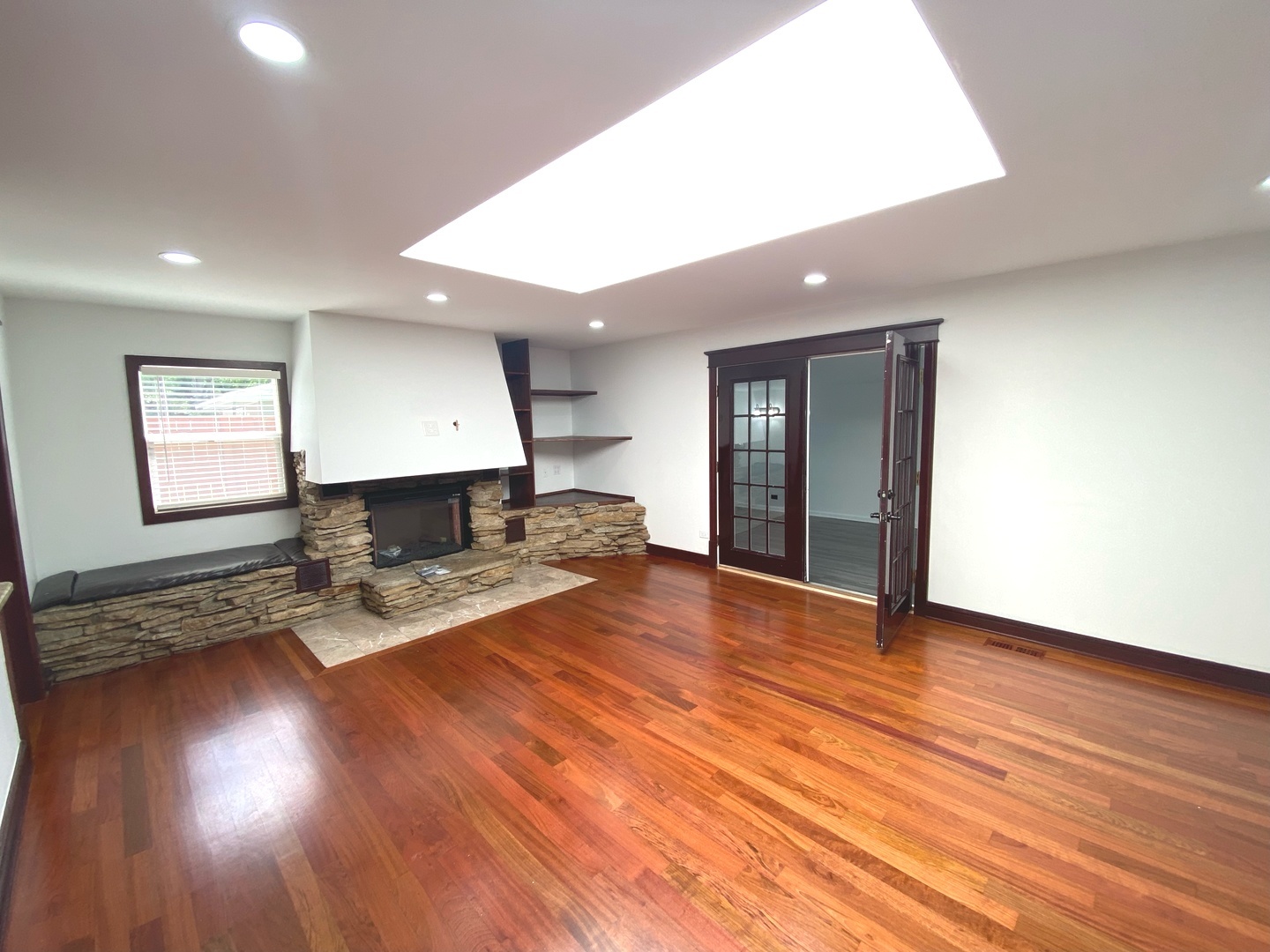 282 Seabury Road Bolingbrook, IL 60440 - Photo 21 of 41 a living room with hard wood floors and a kitchen