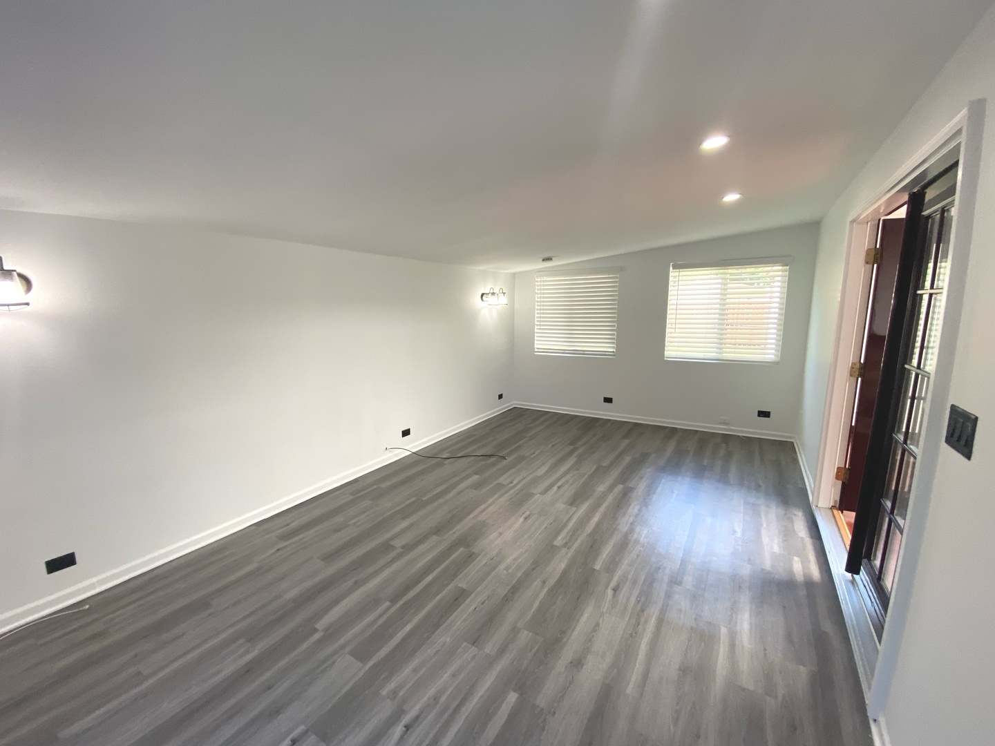 282 Seabury Road Bolingbrook, IL 60440 - Photo 23 of 41 an empty room with wooden floor and windows