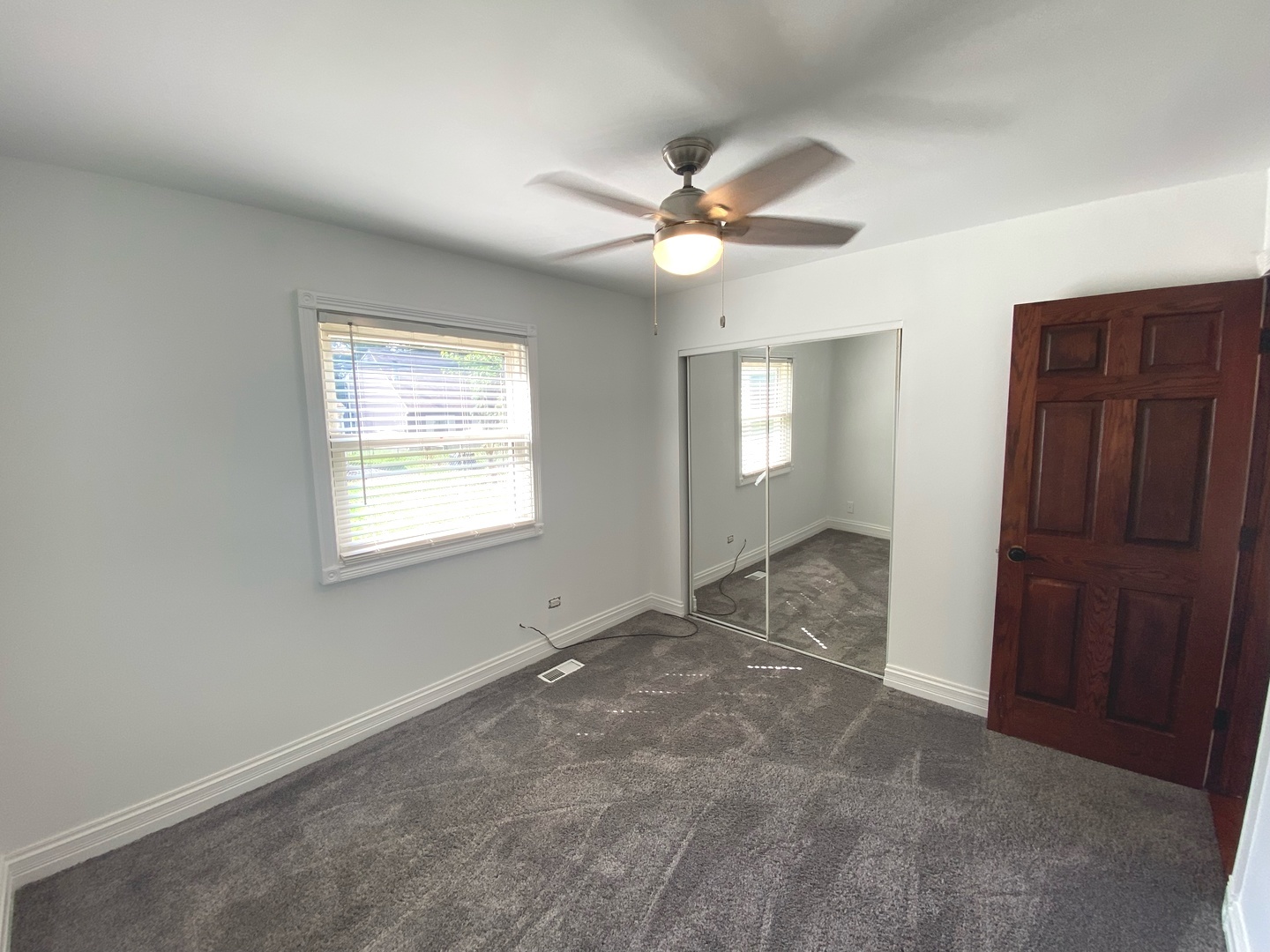 282 Seabury Road Bolingbrook, IL 60440 - Photo 29 of 41 a view of an empty room with a window
