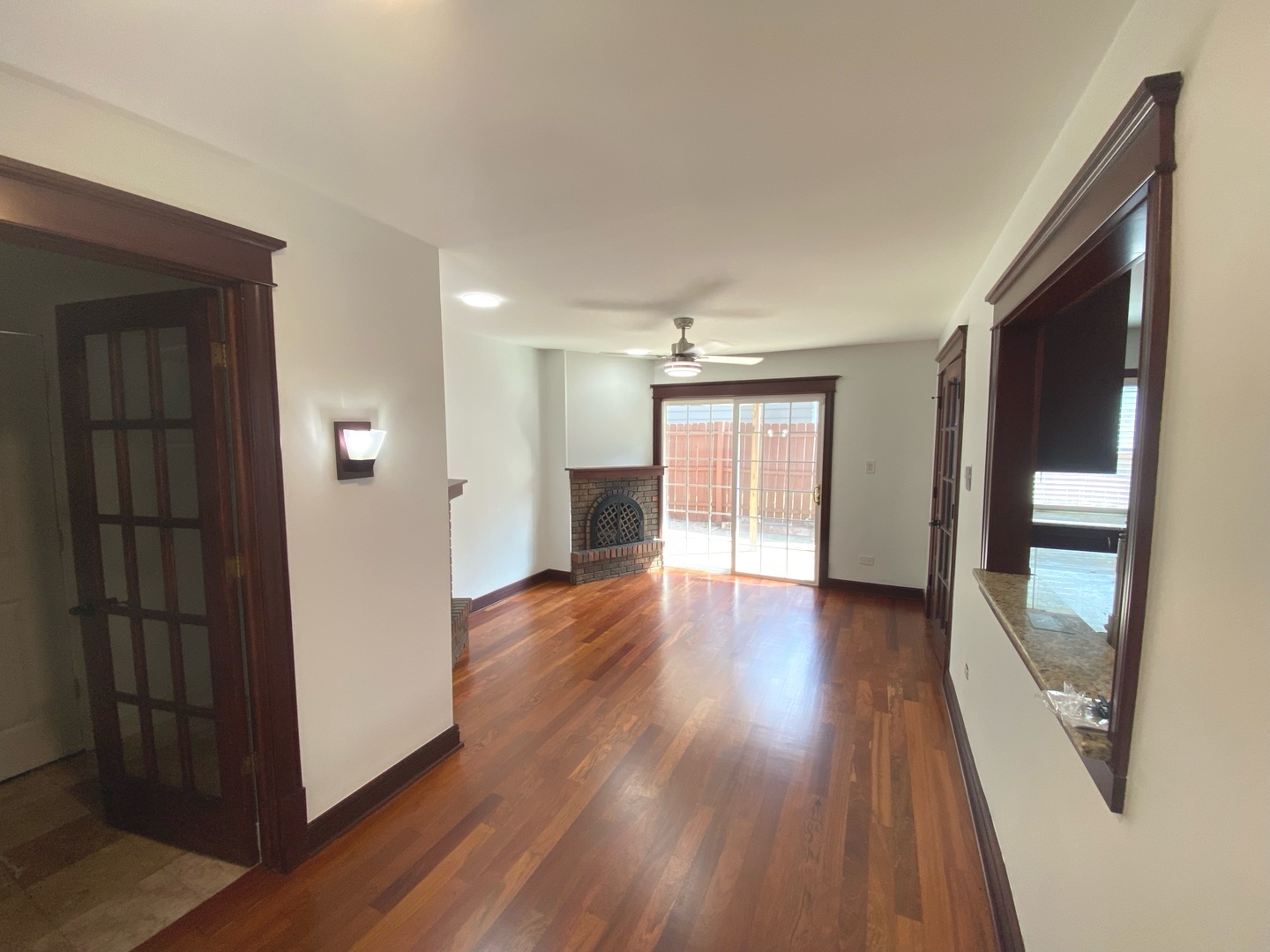 282 Seabury Road Bolingbrook, IL 60440 - Photo 3 of 41 wooden floor in an empty room with a window