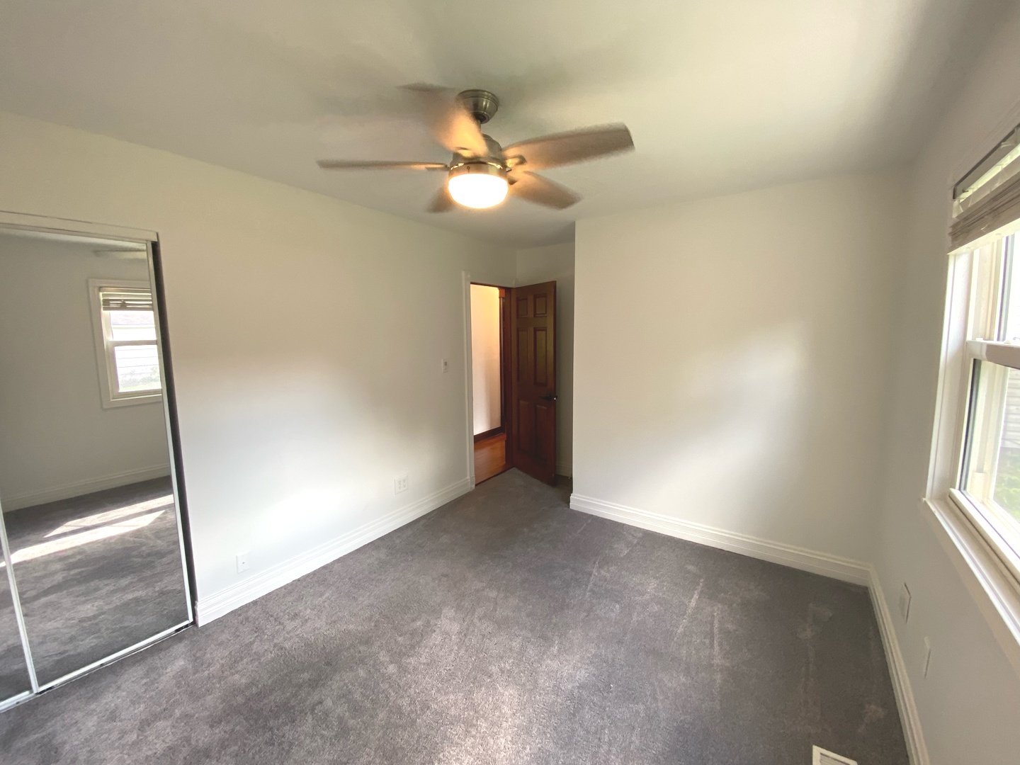 282 Seabury Road Bolingbrook, IL 60440 - Photo 34 of 41 a view of an empty room with a window