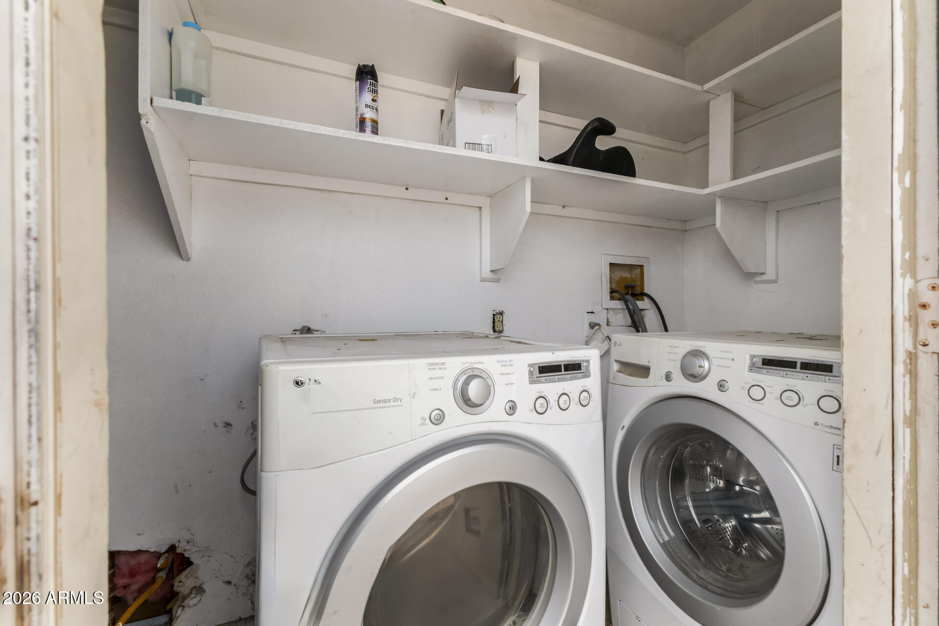936 West Rio Salado Parkway, Unit 4 Mesa, AZ 85201 - Photo 16 of 20 a view of washer and dryer with kitchen in the background