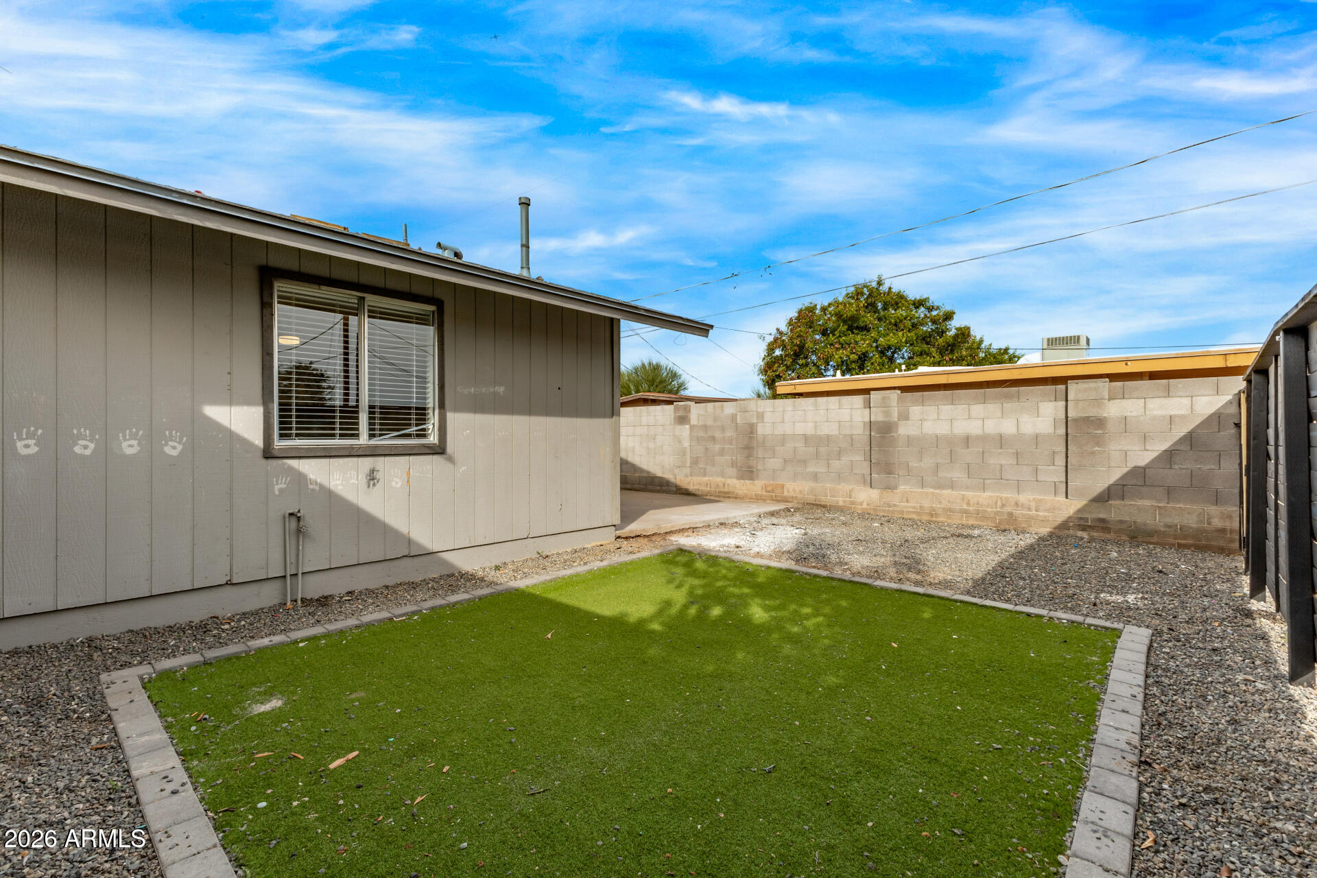 936 West Rio Salado Parkway, Unit 4 Mesa, AZ 85201 - Photo 18 of 20 a view of a backyard with potted plants