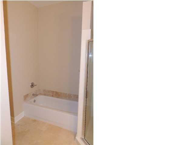 231 Somerset Bridge Road, Unit 2202 Santa Rosa Beach, FL 32459 - Photo 16 of 16 a bathroom with a bathtub and a shower