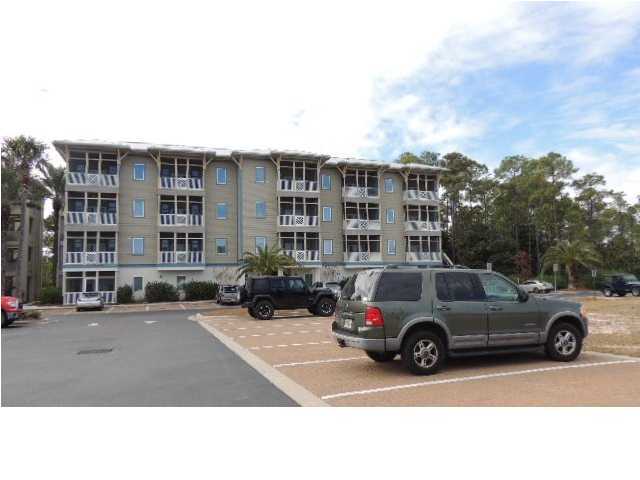 231 Somerset Bridge Road, Unit 2202 Santa Rosa Beach, FL 32459 - Photo 3 of 16 a view of a cars parked in front of a building