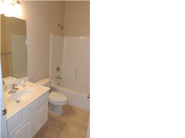 231 Somerset Bridge Road, Unit 2202 Santa Rosa Beach, FL 32459 - Photo 6 of 16 a bathroom with a toilet a sink and a bathtub