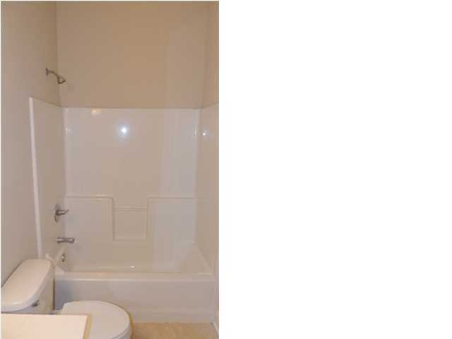 231 Somerset Bridge Road, Unit 2202 Santa Rosa Beach, FL 32459 - Photo 7 of 16 a bathroom with a toilet and a bathtub