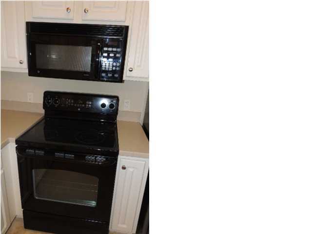 231 Somerset Bridge Road, Unit 2202 Santa Rosa Beach, FL 32459 - Photo 10 of 16 a close view of washer and dryer