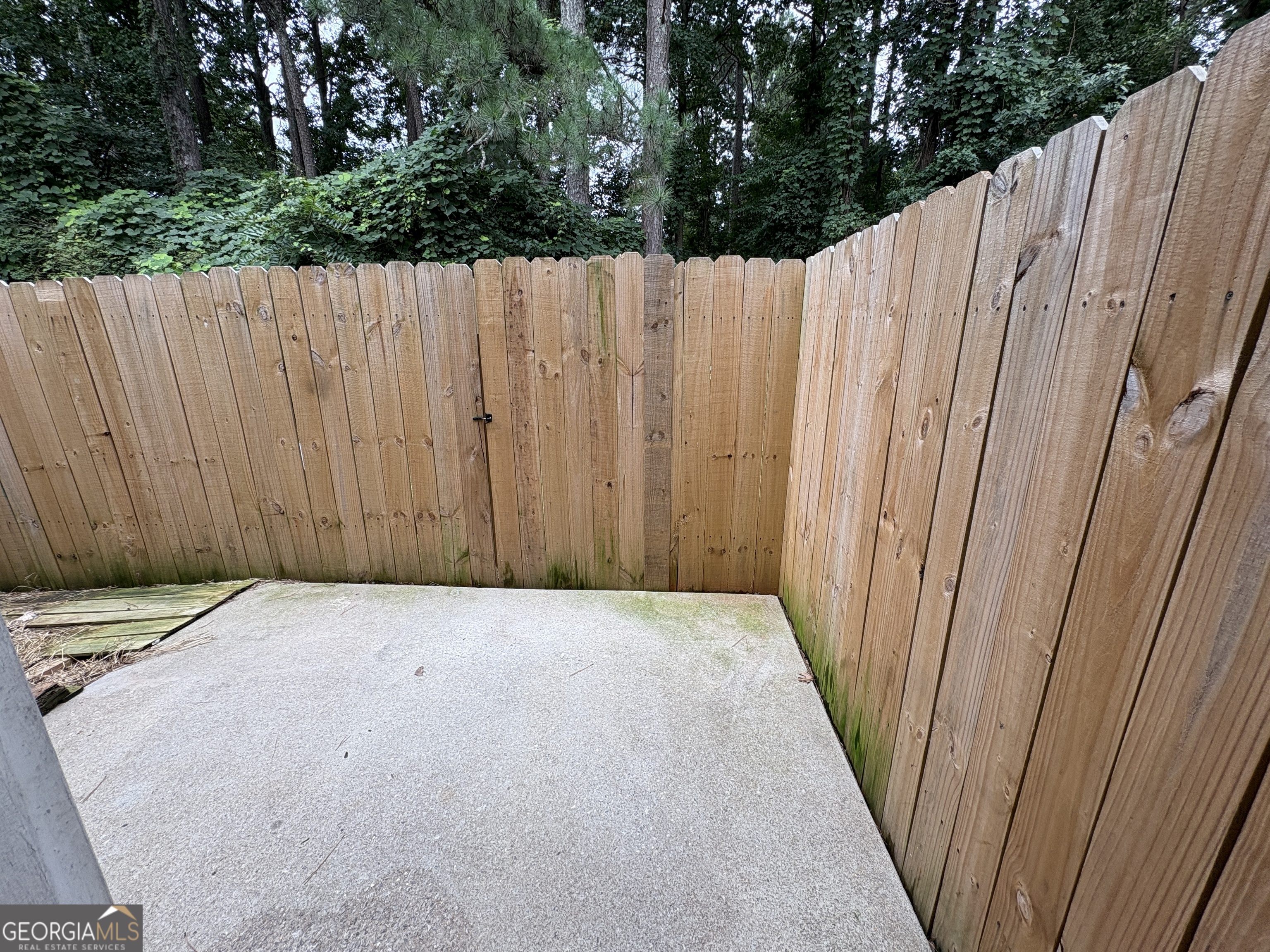 2485 Emma Way Northwest, Unit 2485 Lawrenceville, GA 30044 - Photo 20 of 20 a view of a backyard