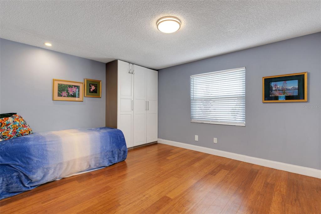 1065 Tartan Drive, Unit C Palm Harbor, FL 34684 - Photo 30 of 91 a view of room with window and ceiling fan