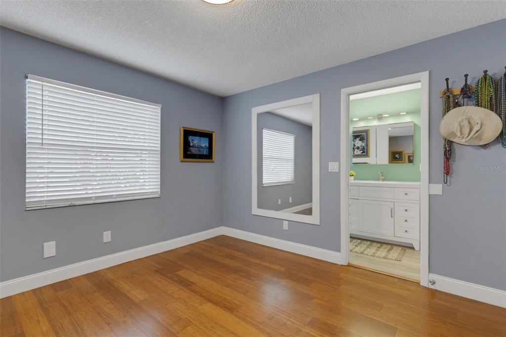 1065 Tartan Drive, Unit C Palm Harbor, FL 34684 - Photo 33 of 91 a view of an empty room with a window