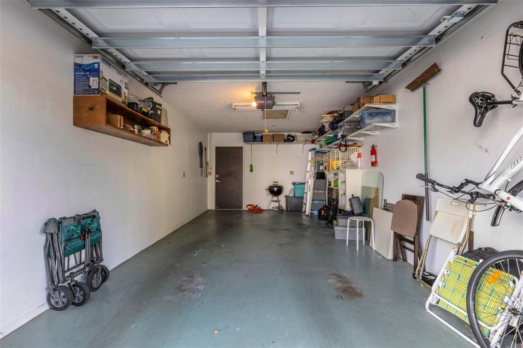 1065 Tartan Drive, Unit C Palm Harbor, FL 34684 - Photo 41 of 91 a view of a livingroom with furniture and a ceiling fan