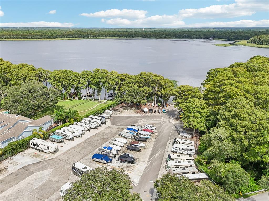 1065 Tartan Drive, Unit C Palm Harbor, FL 34684 - Photo 69 of 91 a view of a lake with a lake