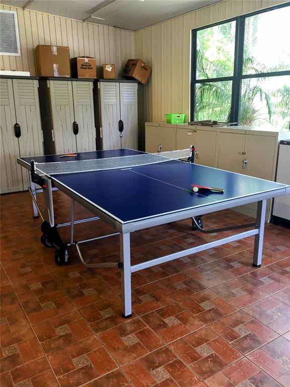 1065 Tartan Drive, Unit C Palm Harbor, FL 34684 - Photo 71 of 91 a room with pool table and windows