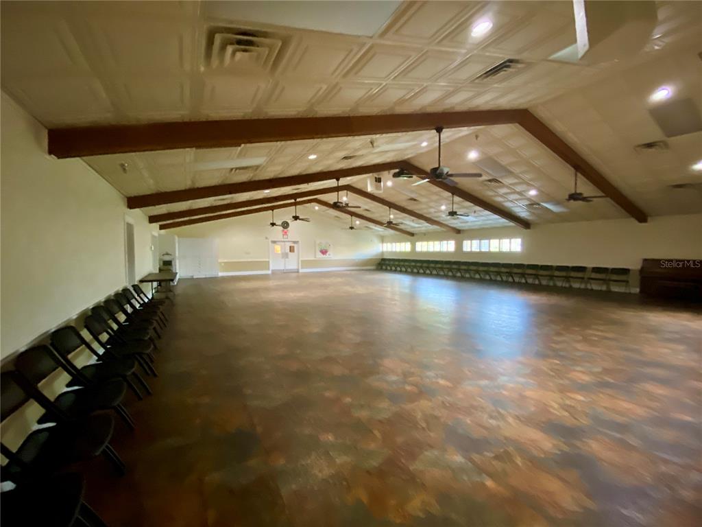 1065 Tartan Drive, Unit C Palm Harbor, FL 34684 - Photo 74 of 91 a view of a room with gym equipment