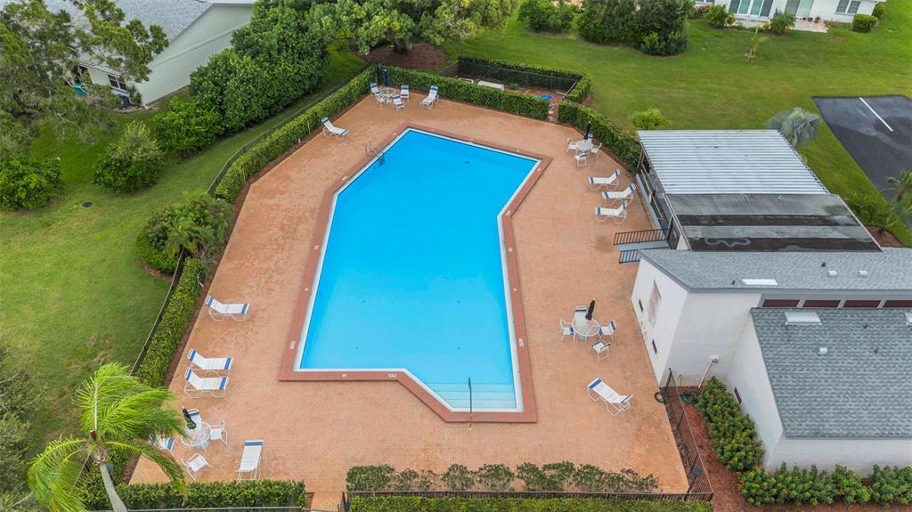 1065 Tartan Drive, Unit C Palm Harbor, FL 34684 - Photo 86 of 91 an aerial view of a house with a yard