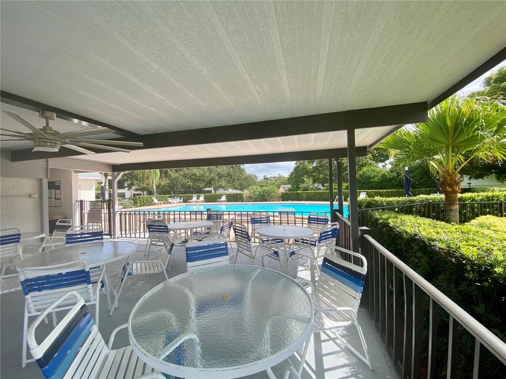 1065 Tartan Drive, Unit C Palm Harbor, FL 34684 - Photo 90 of 91 a outdoor view with a sitting space