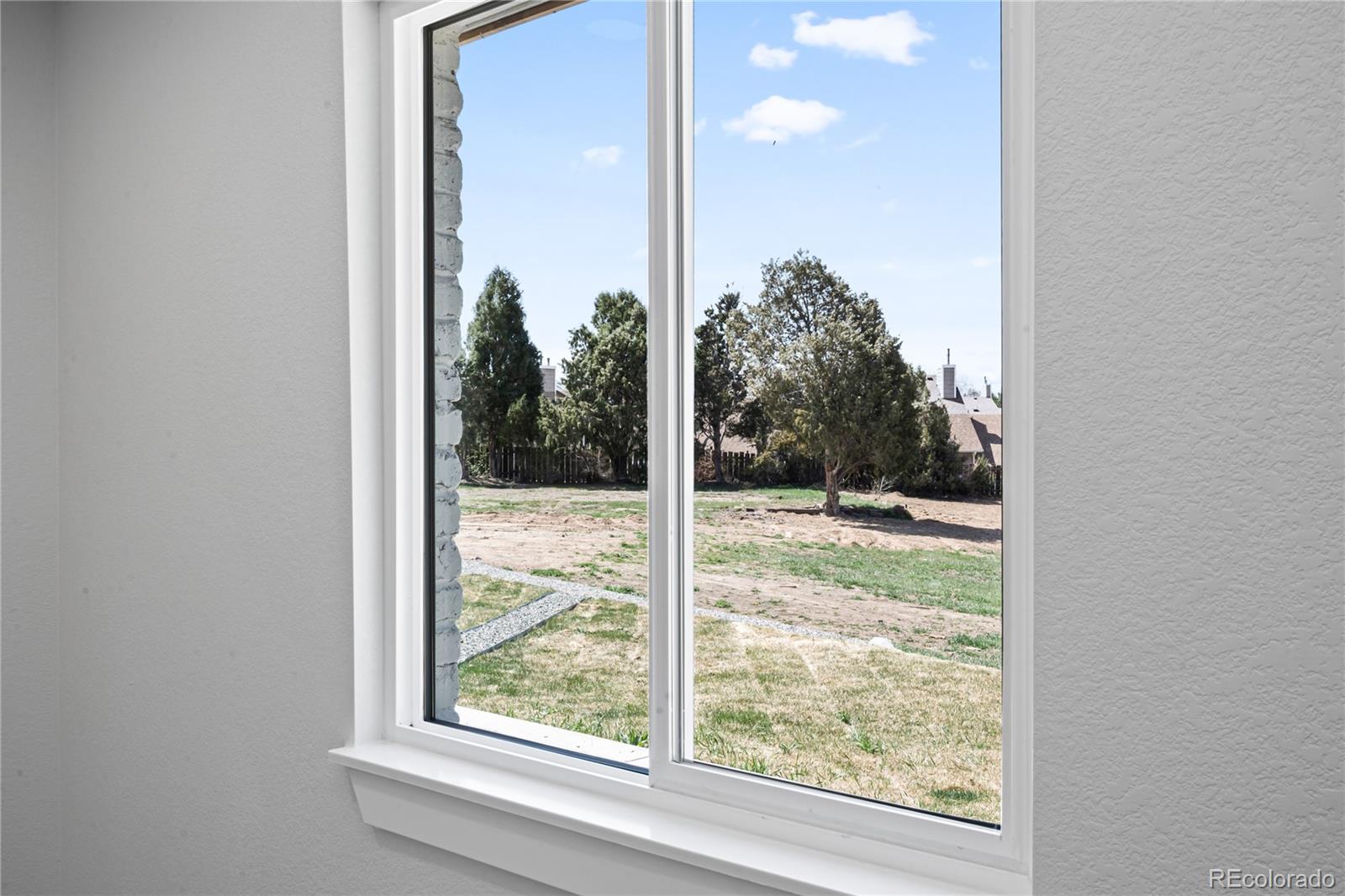 6766 Zenobia Loop Westminster, CO 80030 - Photo 20 of 50 a view of a room that has a mirror